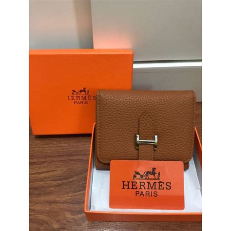 harga dompet Hermes agustus